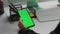 Employee holding mockup smartphone in hand closeup. Businessman read messages