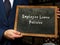 Employee Leave Policies phrase on chalkboard