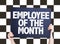 Employee of the Month card on checkered background