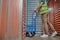 Employee in a reflective vest working in the storehouse