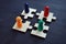 Employee relations and teamwork. Pieces of puzzles