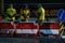 Employees of the road service in special yellow vests perform work on the repair of the roadway