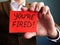 Employer shows phrase You are fired. Wrongful Dismissal concept