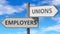 Employers and unions as a choice - pictured as words Employers, unions on road signs to show that when a person makes decision he