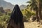 Empowered Woman: Serene Beauty of a Veiled Lady in the Desert