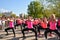Empowering Women Unleash Their Strength: Piloxing Fitness Class in Vibrant Public Park