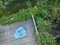 Empty Adirondack chair on a wooden backyard deck