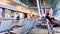 Empty airport interior during coronavirus pandemic, passengers wearing face masks, health and travel