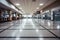 empty airport terminal with blurred motion of passing people, vehicles, and aircraft