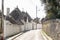 Empty Alberobello Trulli Street, Puglia, Italy. No one is walking down the street.