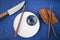 Empty Asian dishware, bowl, pate and chopsticks on the blue background