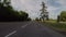 Empty asphalt road against the background of trees