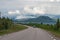 Empty asphalt road in the middle of the mountains in the wild Abisko, Sweden