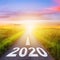 Empty asphalt road and New year 2020 concept. Driving on an empty road to Goals 2020