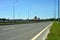 Empty asphalt road without people and cars