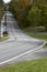 Empty asphalt road with a steep climb