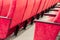 Empty assembly hall with red chairs in rows. concept of trainings, business meetings and conferences.