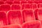 Empty assembly hall with red chairs in rows. concept of trainings, business meetings and conferences.