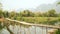 empty bamboo bridge on limestone mountain background