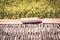 Empty bamboo table for product display rice field blur background nature environment lifestyle concept idea