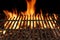 Empty Barbecue Grill Close-up With Bright Flames