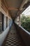 Empty barbed corridor in S21 Tuol Sleng Genocide Museum Phnom Penh Cambodia