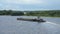 Empty barge on river on summer warm day