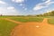 Empty baseball field from behind home plate