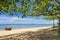 Empty beach with longtail boat on the island of Koh Libong, Thailand