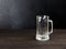 Empty beer mug, large empty pint of beer on old wooden table