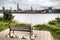 Empty bench overlooking the Antwerp skyline with the schelde river
