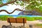 Empty bench overlooking blue ocean at Makapu`u Beach park