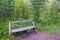 The empty bench, standing in the woods