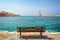 Empty bench with view on the venitian habor of Chania in Crete Grece