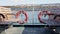 Empty benches on board pleasure ferry. passenger boat floats in bay or strait across sea. Lifebuoys of white and red