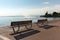 Empty benches on lakeshore of Garda lake, Bardolino