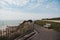 Empty benches at Ramsgate seafront on hot sunny morning