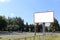 Empty billboard in an urban environment on a summer sunny day.