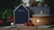 Empty blackboard copy space next to clay cooking pot and fresh vegetable vegetarian home cooking