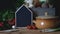 Empty blackboard copy space next to clay cooking pot and fresh vegetable vegetarian home cooking