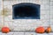 Empty blackboard in stone wall with chalk rubbed out, Advertising Isolated copyspace, Orange Pumpkin on the ground