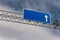 Empty blue metallic road sign direction