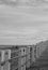 Empty boardwalk rises above the beach