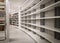 Empty bookshelves from a new library building