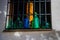 Empty bottles exposed on the windowsill .