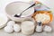 Empty bowl, ingredients for preparation cottage cheese pancakes, spoon