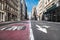 Empty Broadway asphalt street with bus public transport lane in SoHo district in Manhattan, New York City.