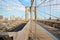 Empty Brooklyn Bridge in a sunny morning, New York