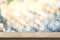 Empty brown wood table top with blur sparkling soft pastel blue and orange bokeh abstract background,panoramic banner for display