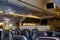 Empty cabin of a large aircraft with rows of seats